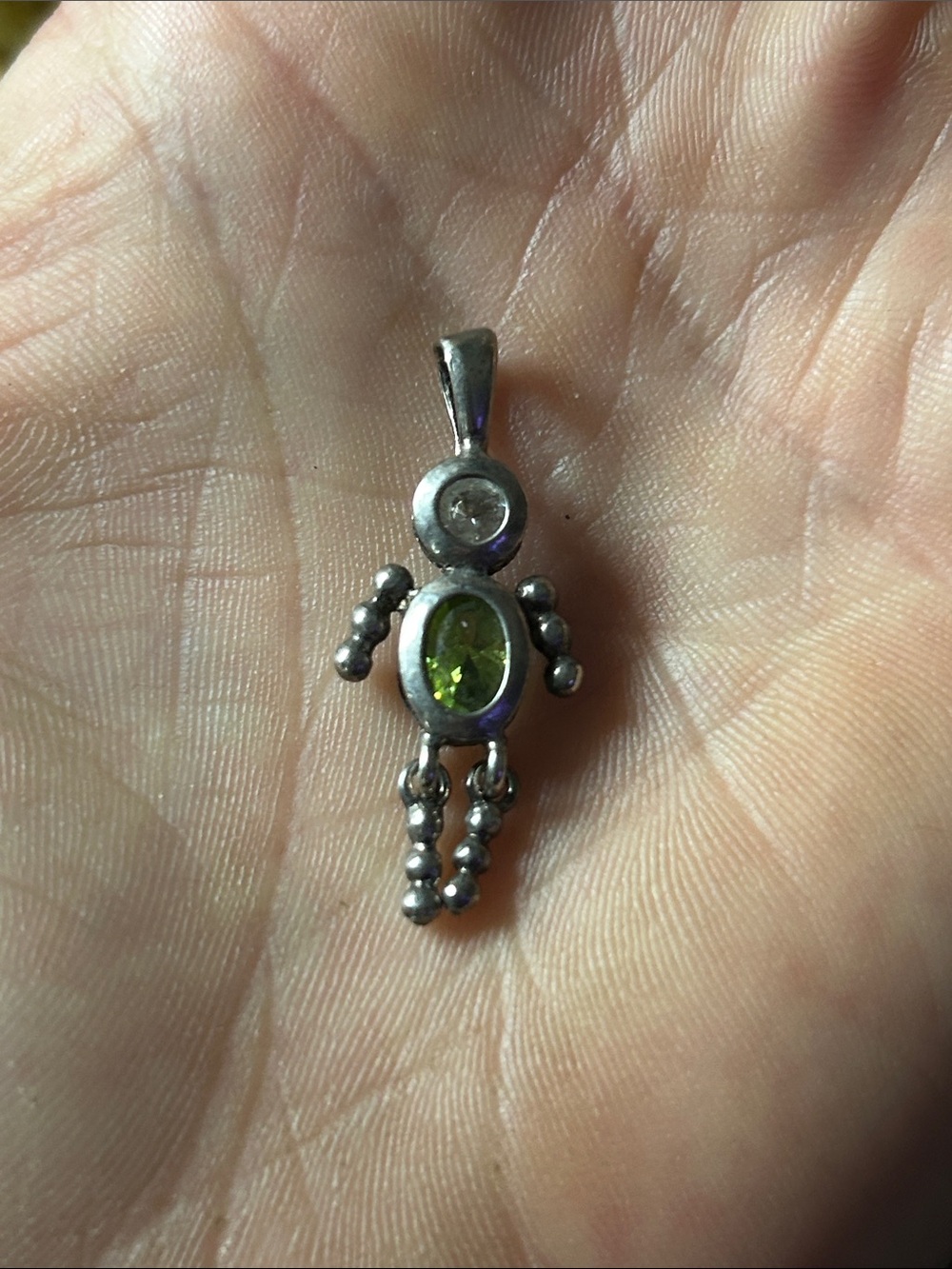 August sterling silver peridot boy charm